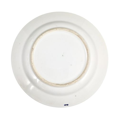 fig 3. A five-piece late 18th-century Chinese export porcelain tea service featuring two cream jugs, two saucers, and a footed dish decorated with cobalt blue borders, gilt detailing, and central monograms.