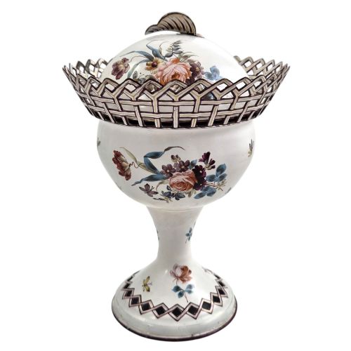 fig 3. A pair of off-white 19th-century French tole peinte chestnut urns featuring hand-painted botanical motifs, pierced lattice galleries, and shell-form finials on the lids.