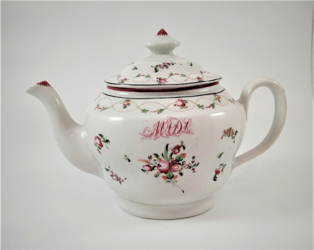 A hard paste porcelain New Hall teapot of oval shape,c.1800