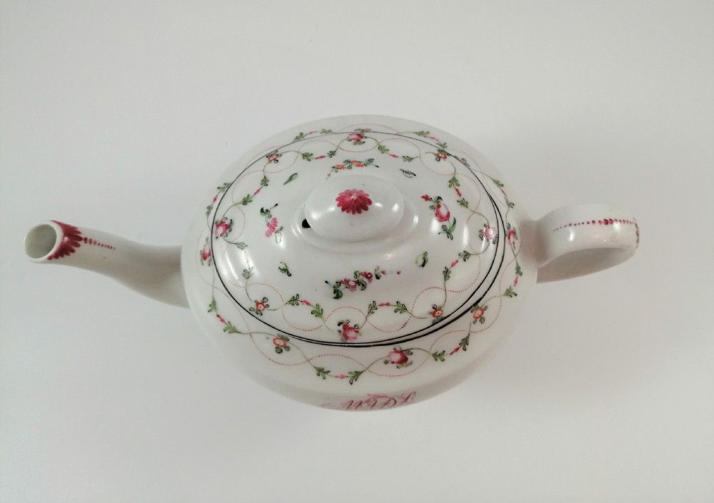 A hard paste porcelain New Hall teapot of oval shape,c.1800 View IX