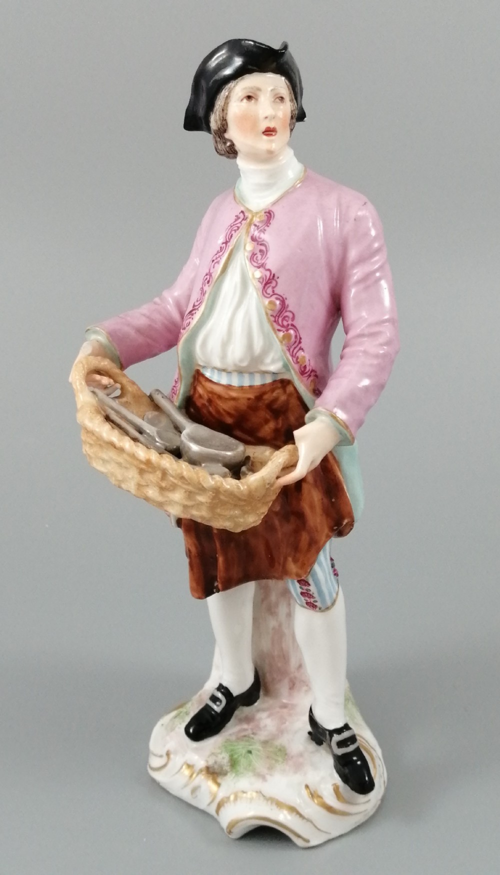 Antique Chelsea porcelain figurine, “A Spoon Seller”, c. 1758 - 1769