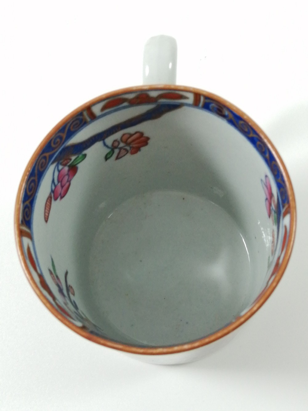 Antique Spode Stone China coffee cap and saucer in Tobacco Leaf Pattern(