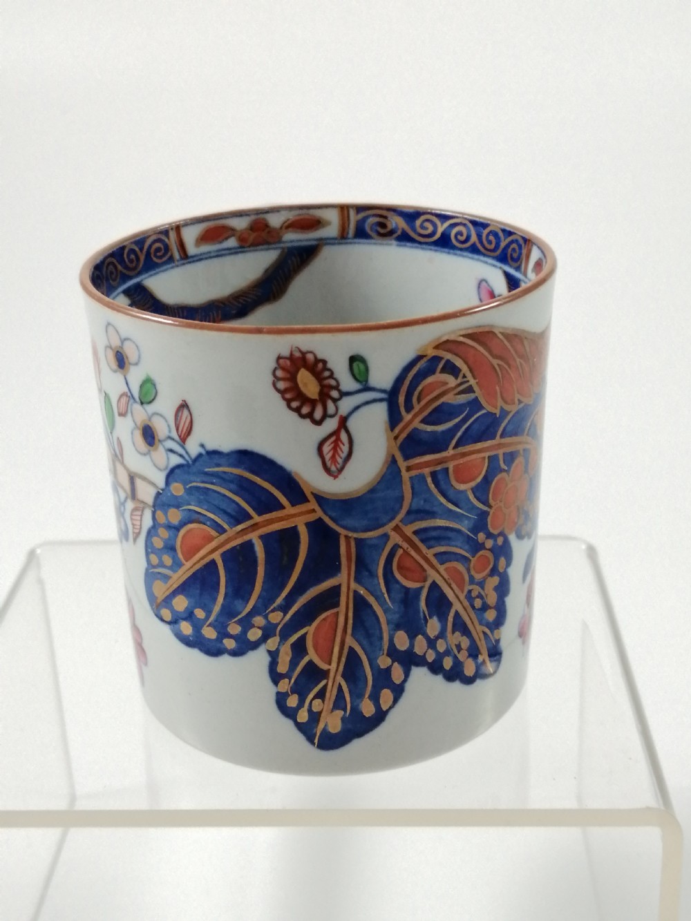 Antique Spode Stone China coffee cap and saucer in Tobacco Leaf Pattern(