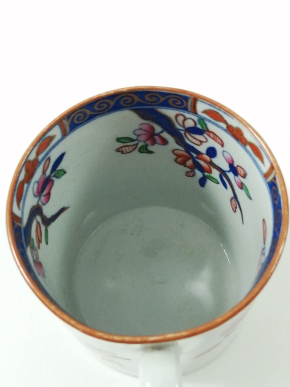 Antique Spode Stone China coffee cap and saucer in Tobacco Leaf Pattern(