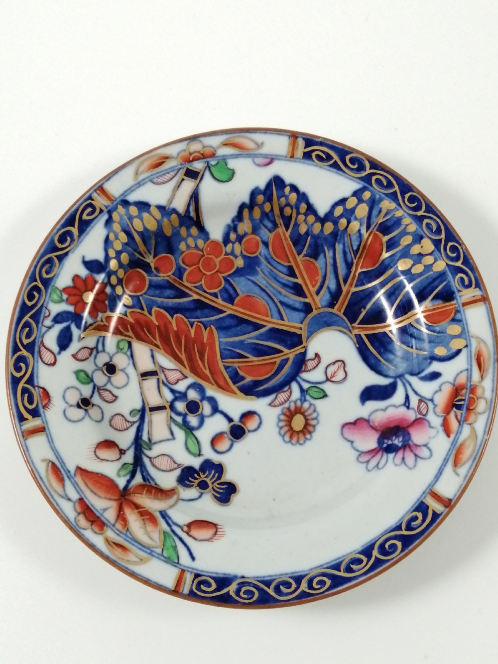 Antique Spode Stone China coffee cap and saucer in Tobacco Leaf Pattern(