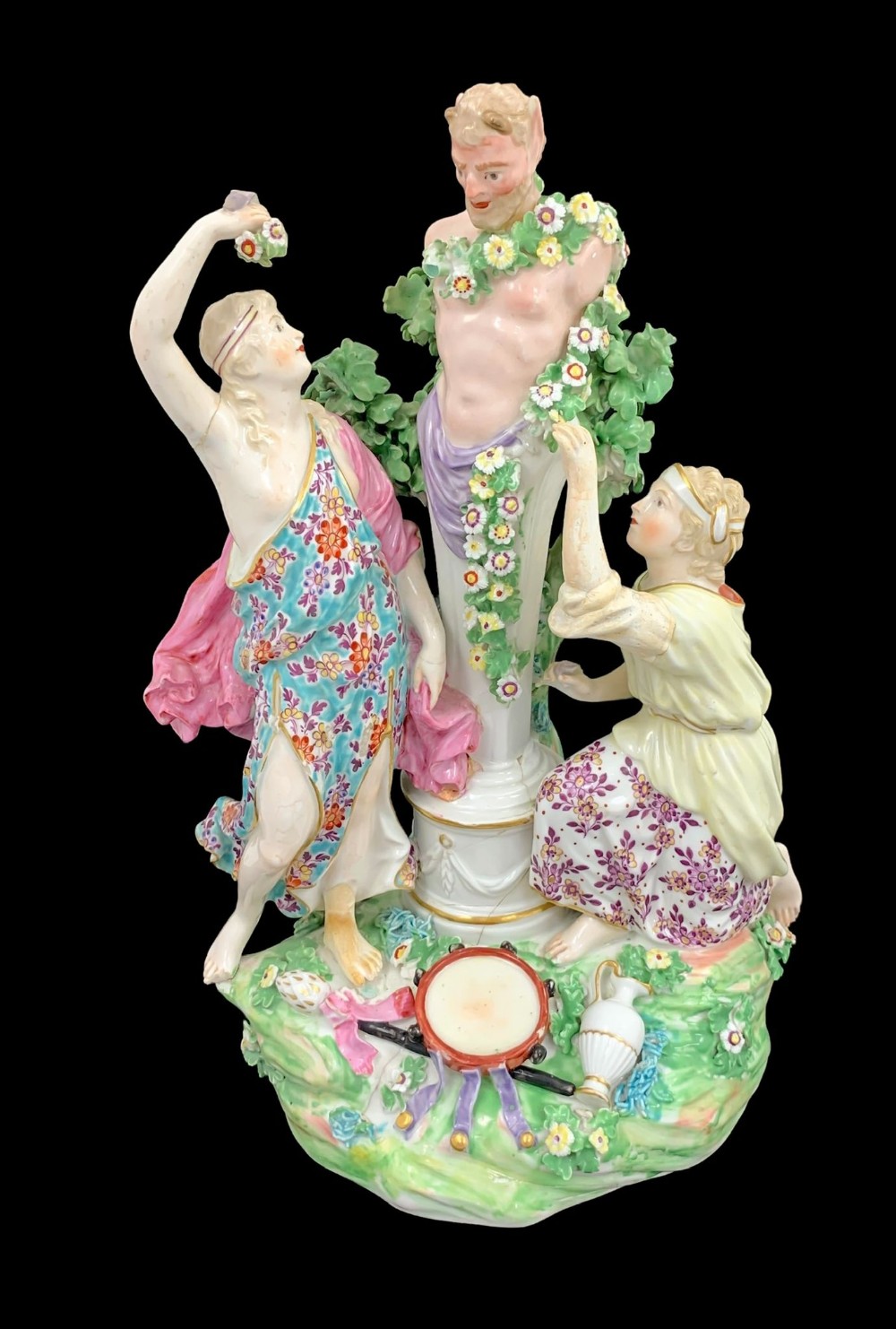Early Derby figure group of «Two Bacchantes adorning a bust of Pan»