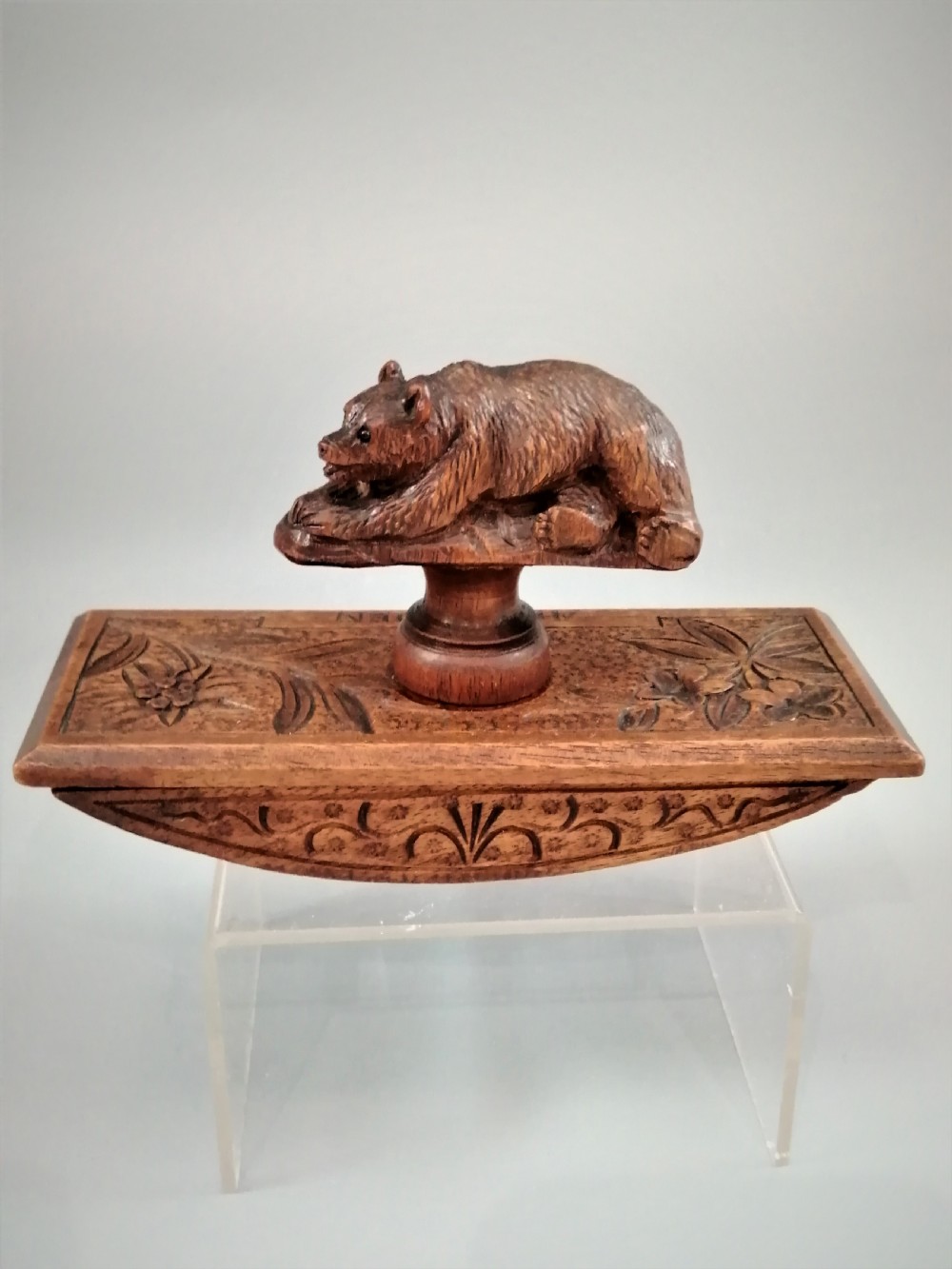 19th century Black Forest walnut desk blotter with a bear