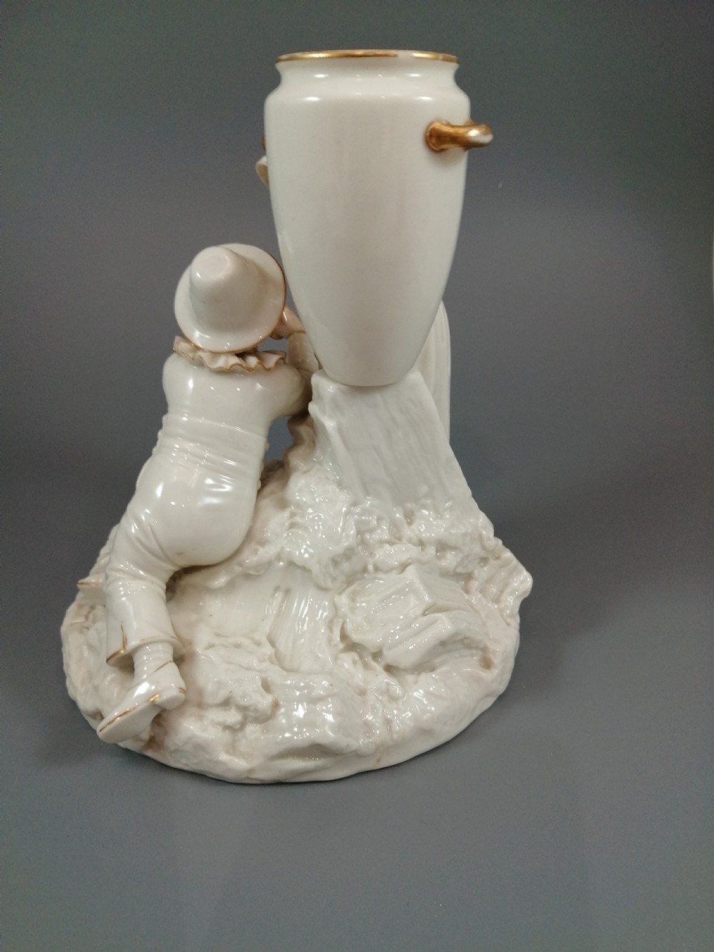 Royal Worcester group: boy with horn and girl . James Hadley, 1881. View V