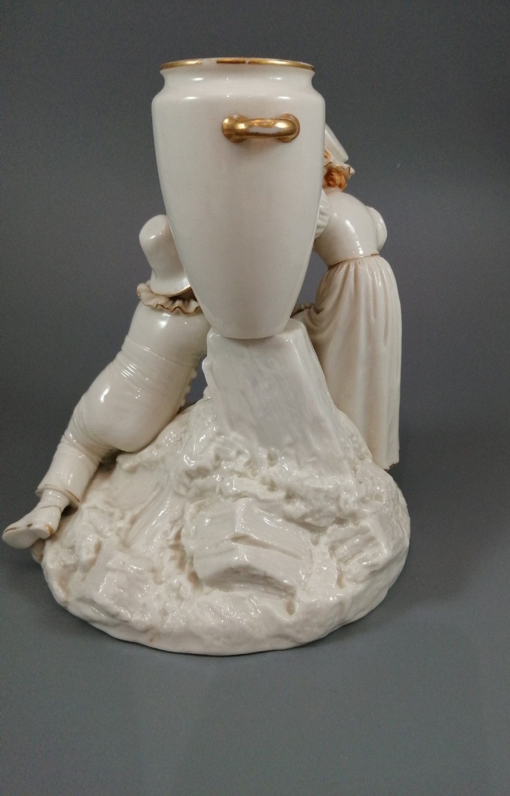 Royal Worcester group: boy with horn and girl . James Hadley, 1881. View VI