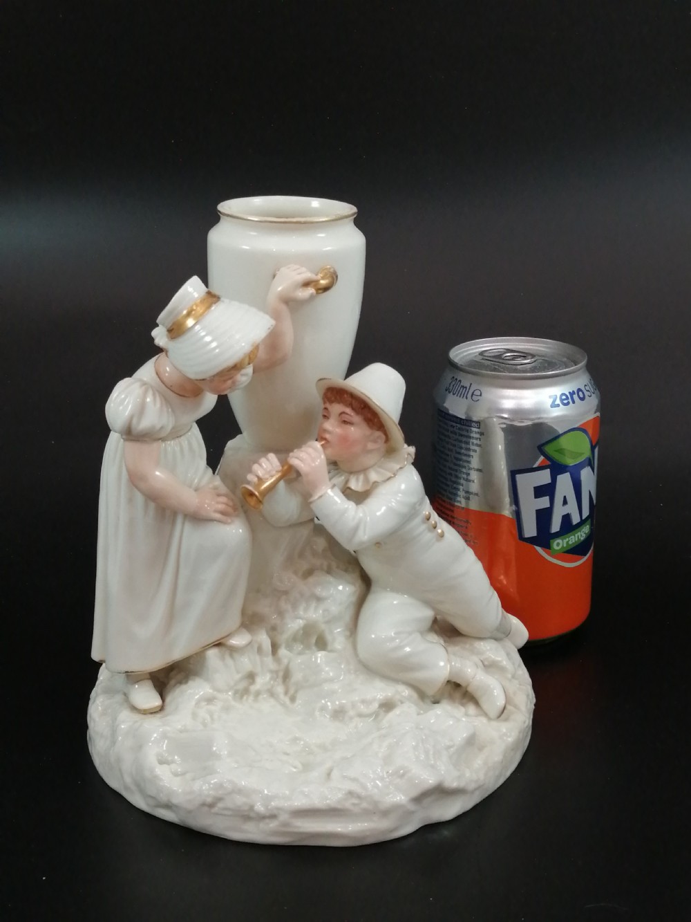 Royal Worcester group: boy with horn and girl . James Hadley, 1881. View XVIII
