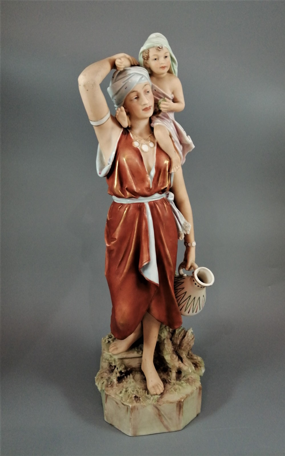 Antique porcelain Royal Dux figurine - oriental woman with child, ?. 19th .
 View VII