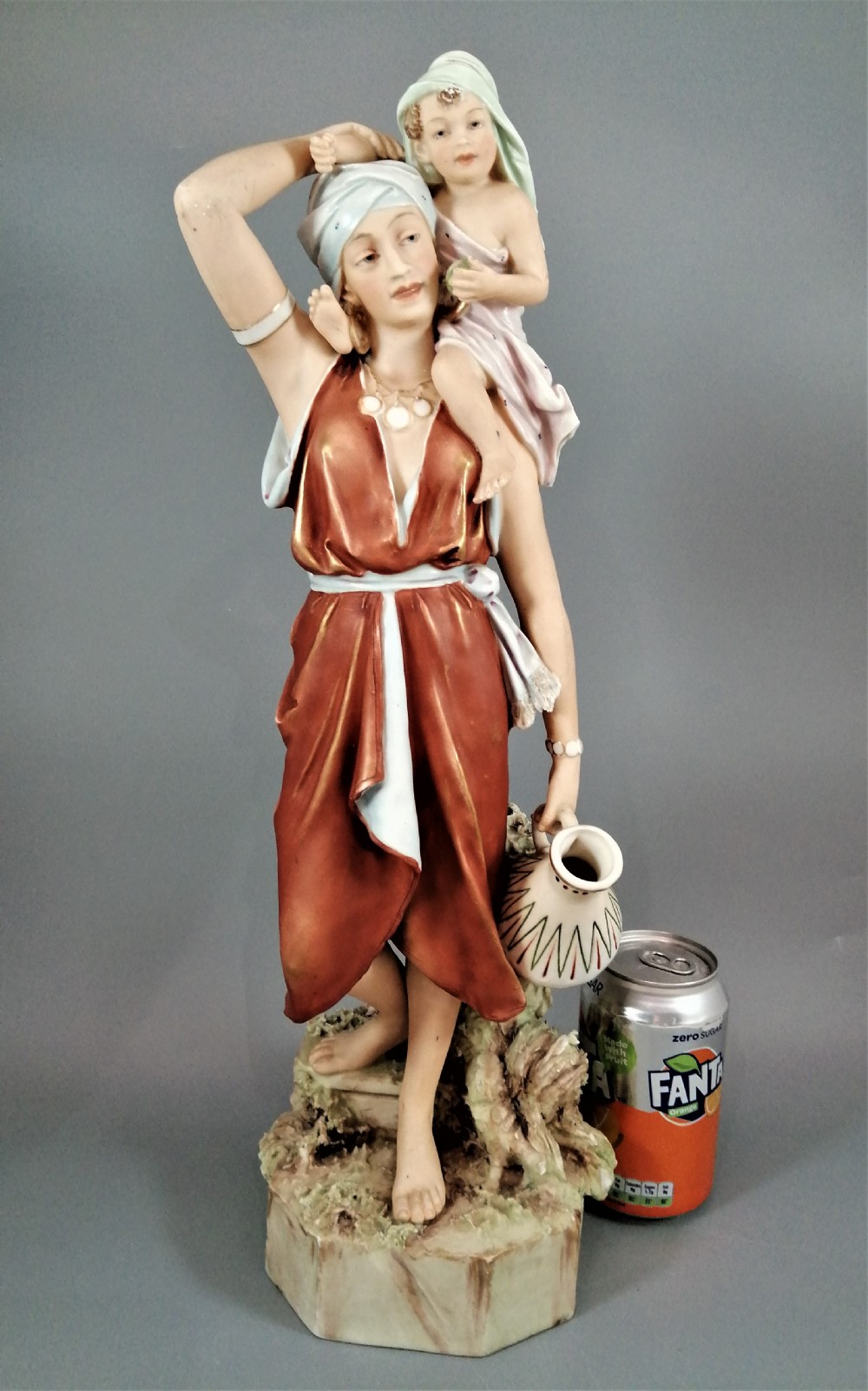 Antique porcelain Royal Dux figurine - oriental woman with child, ?. 19th .
 View X