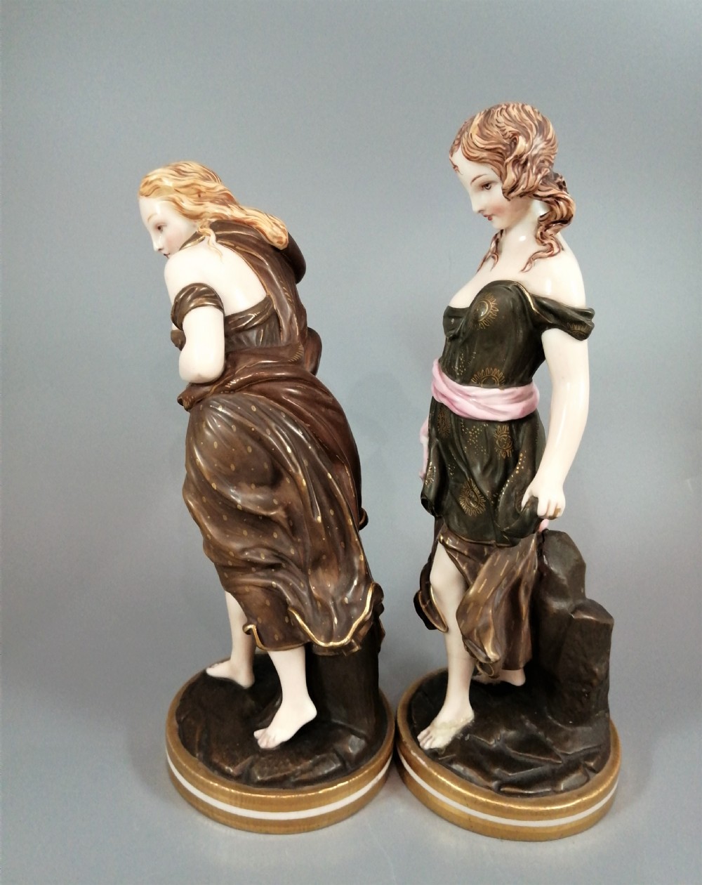 A pair of nineteenth-century Royal Worcester porcelain figurines depicting draped female figures with windblown hair and garments. View III