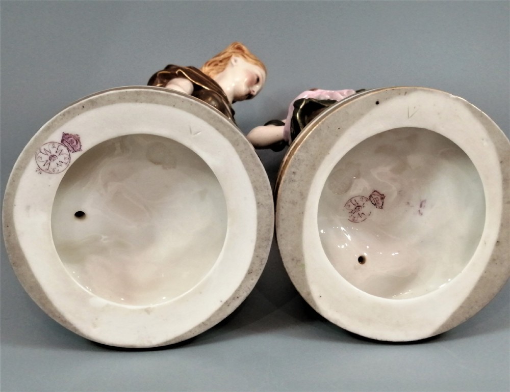 A pair of nineteenth-century Royal Worcester porcelain figurines depicting draped female figures with windblown hair and garments. View VI