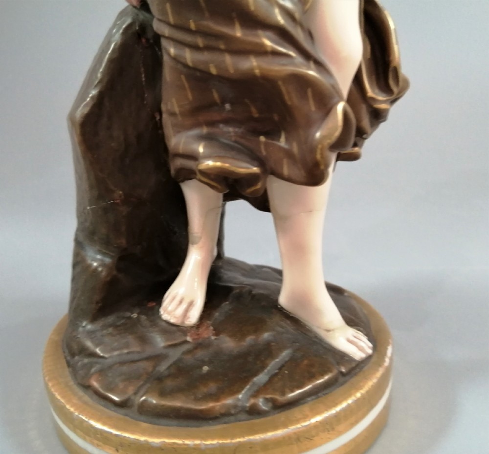 A pair of nineteenth-century Royal Worcester porcelain figurines depicting draped female figures with windblown hair and garments. View XIV