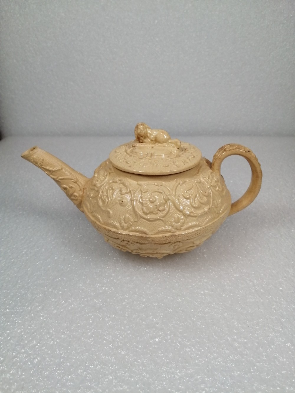 A small caneware teapot with a spaniel finial. Wedgwood, C.1800 View II