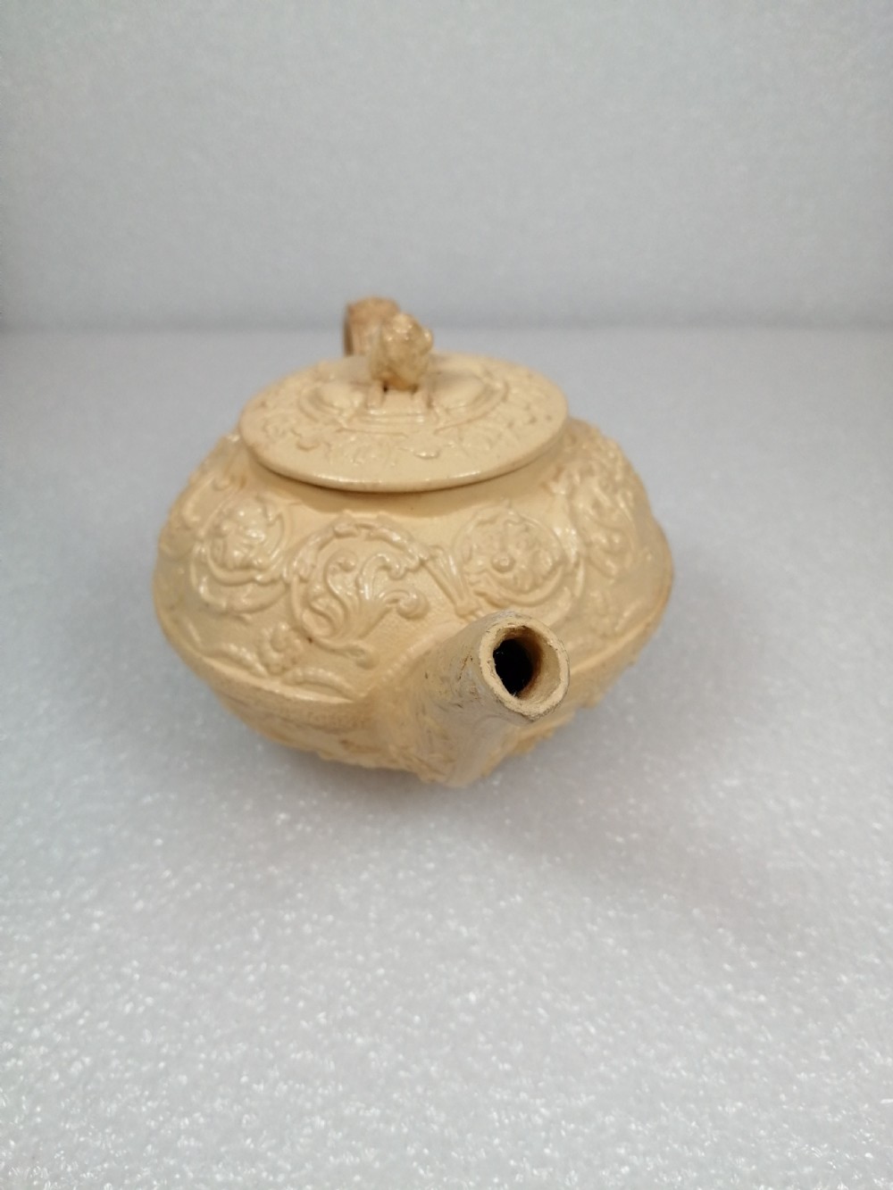 A small caneware teapot with a spaniel finial. Wedgwood, C.1800 View VII