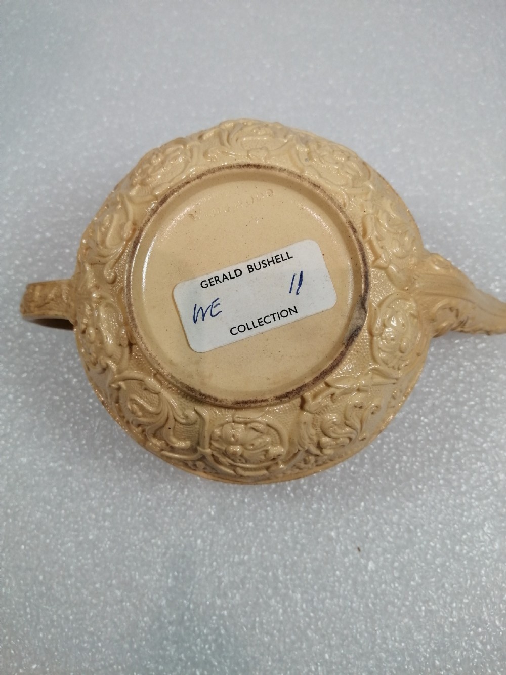 A small caneware teapot with a spaniel finial. Wedgwood, C.1800 View IX
