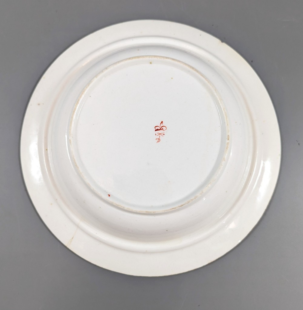 A circular antique porcelain butter dish with stand, decorated with hand-painted Japanese Kakiemon style quail and floral motifs in iron-red, blue, and gold. View X