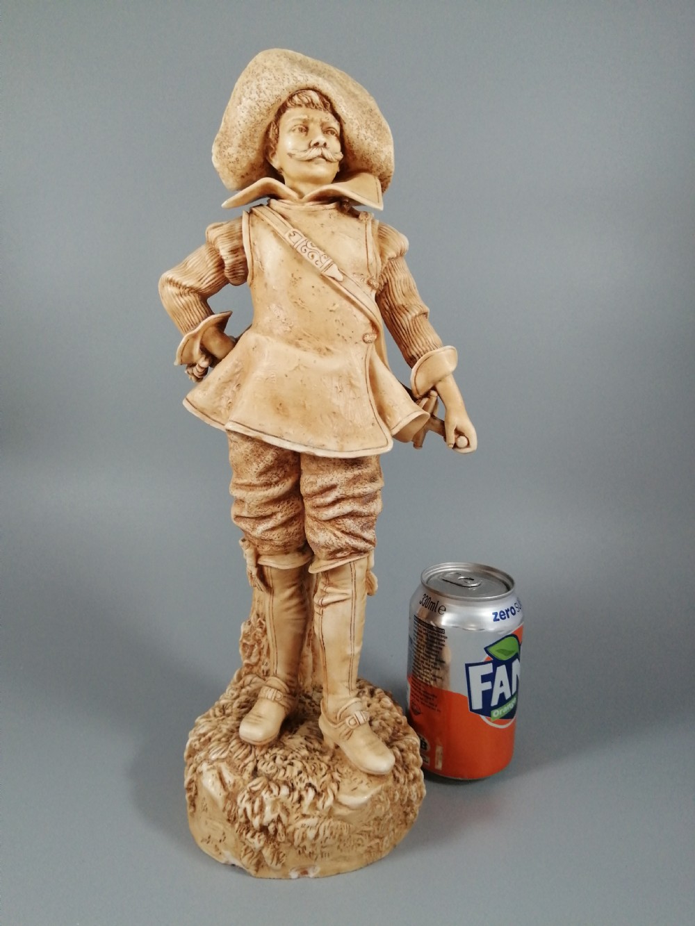 A Robinson and Leadbeater ivory parian ware figure of a musketeer View XI