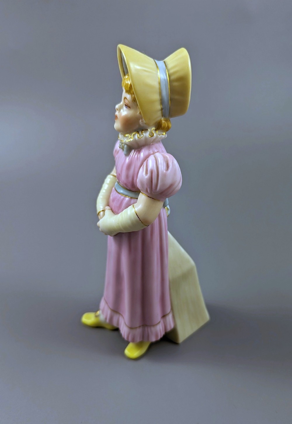 Antique porcelain James Hadley Royal Worcester Kate Greenaway girl sugar shaker View II