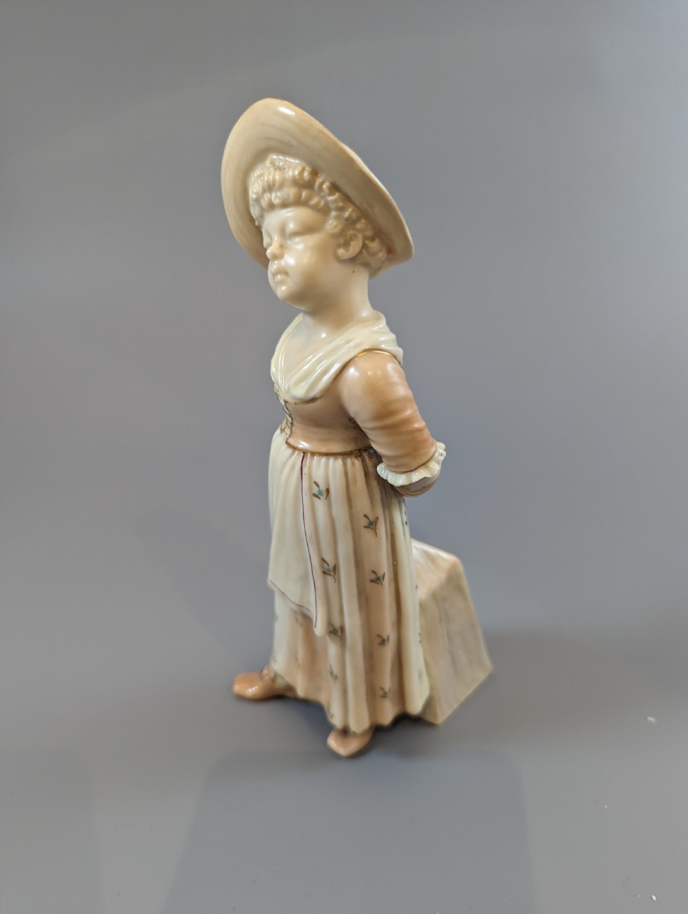 Antique porcelain James Hadley Royal Worcester Kate Greenaway girl sugar shaker View II