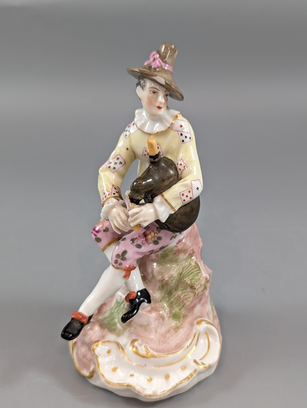 Porcelaine de Paris, Marx Eugene Clauss, Harlequin playing the bagpipe