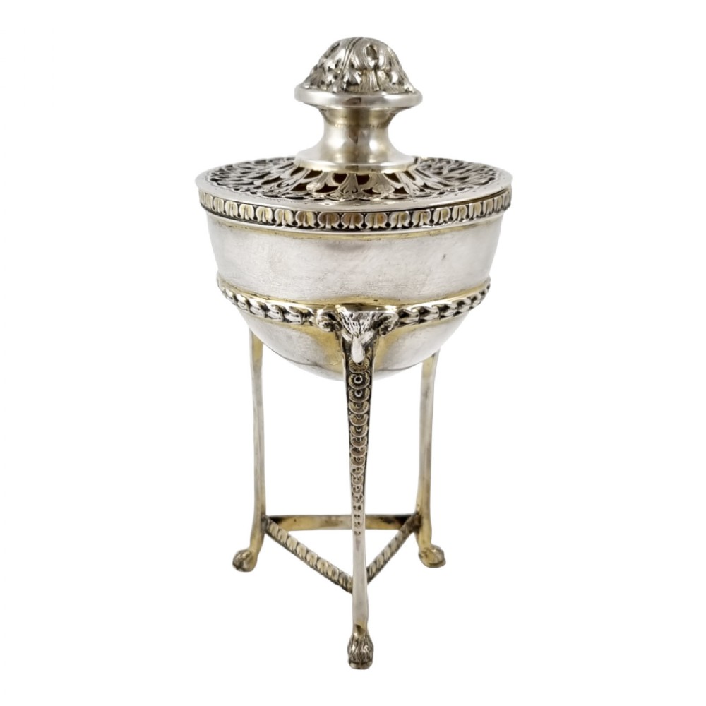 Neoclassical gilt sterling silver potpourri raised on hoof feet and cast with rams heads, Chester