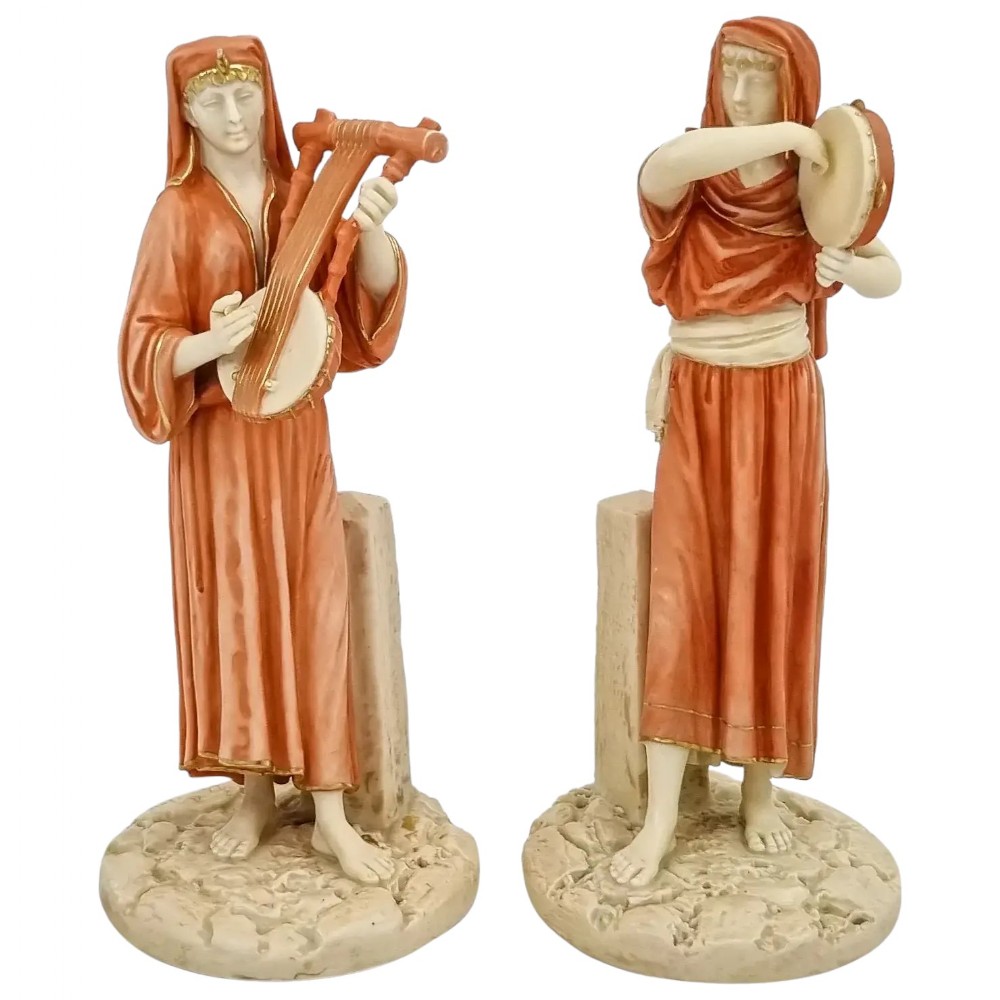 Pair of Victorian Royal Worcester (James Hadley) figurines of Egyptian musicians, model 1084