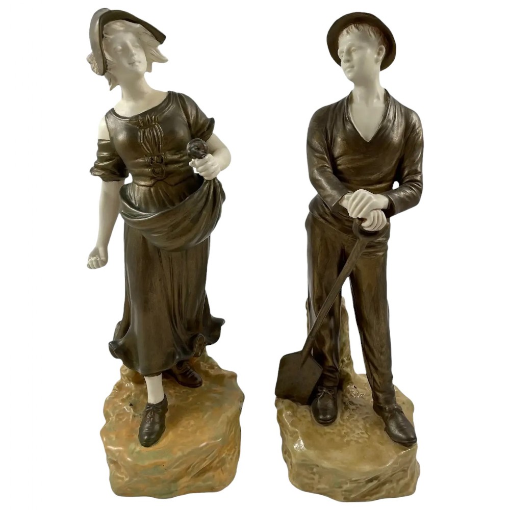 Antique pair of Art Nouveau Theodore Schoop for Bernard Bloch porcelain figurines, farming peasant couple