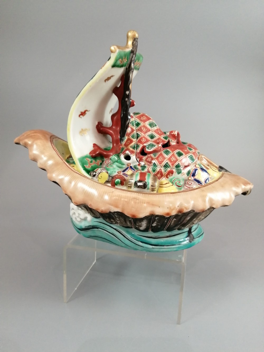 A Japanese Kutani porcelain censer shaped like a Takarabune treasure ship decorated with polychrome enamels and a wave-moulded base. View XXIII