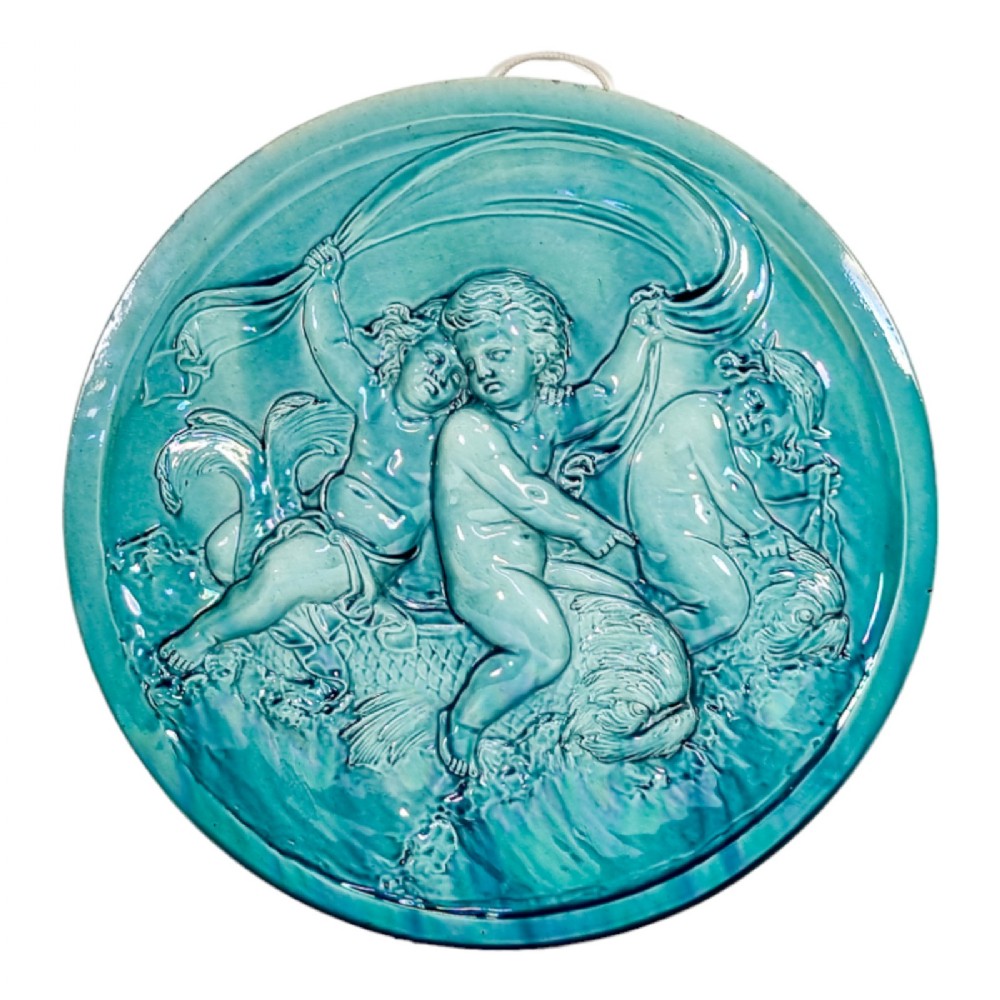 French 1890's Clement Massier huge iridescent turquoise wall charger with putti riding dolphins / sea monsters