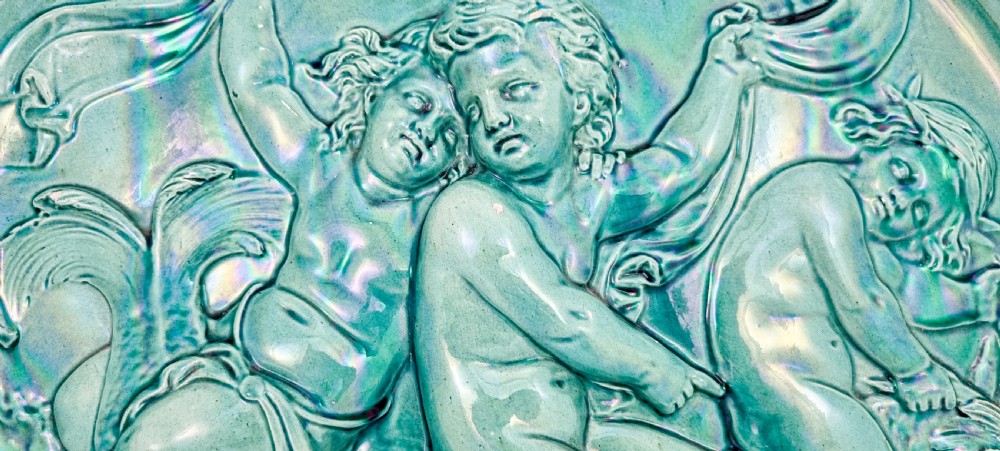 French 1890's Clement Massier huge iridescent turquoise wall charger with putti riding dolphins / sea monsters View VI