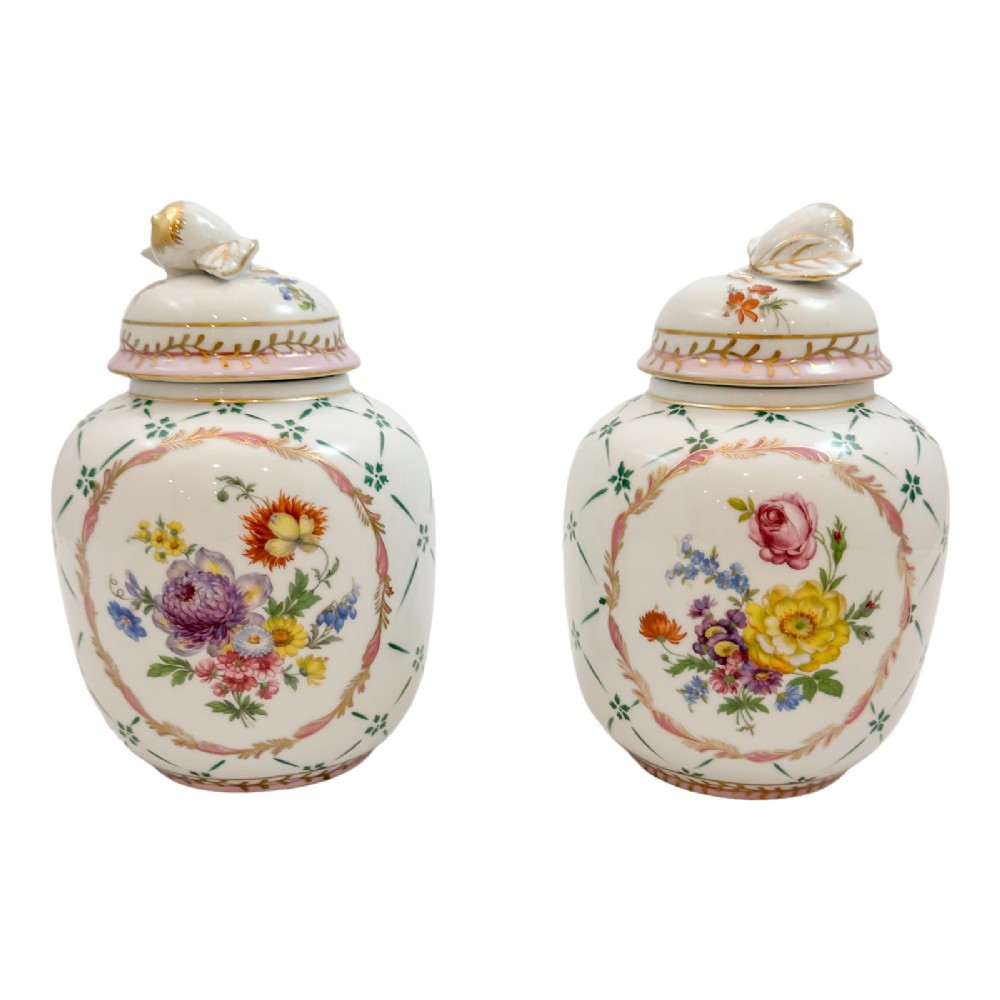 Antique pair of Royal Europe porcelain ginger jars with moulded lids and hand-painted with flowers