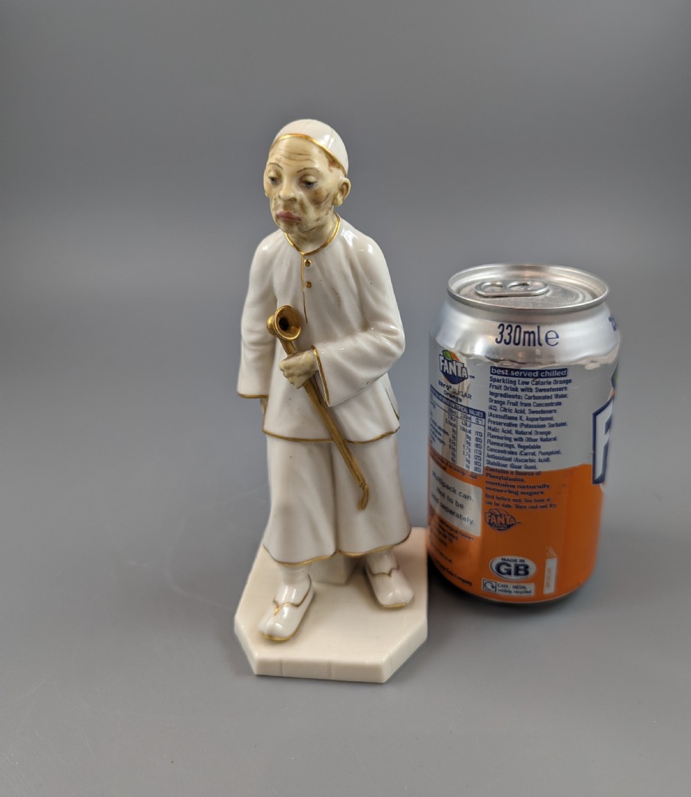 A Royal Worcester figure of a Chinese man,1883 View IX