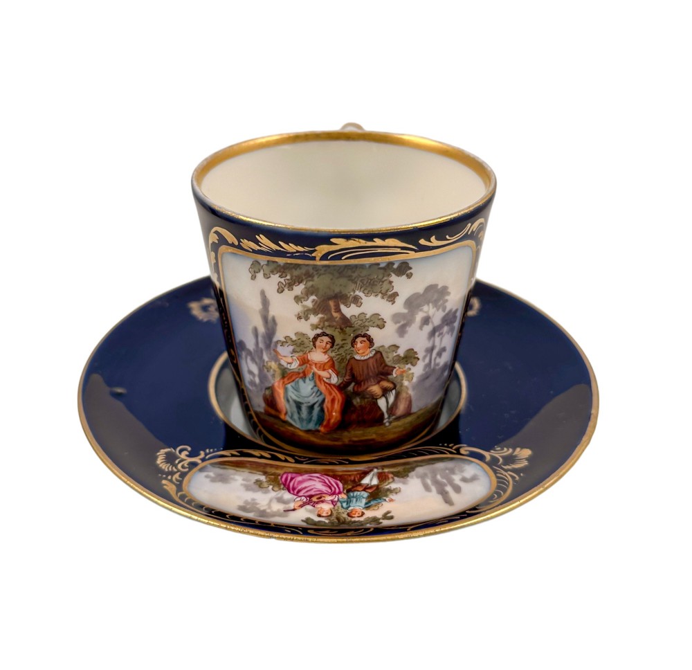 19th century 'Augustus Rex' German porcelain trembleuse cup and matching saucer, courting couples design
