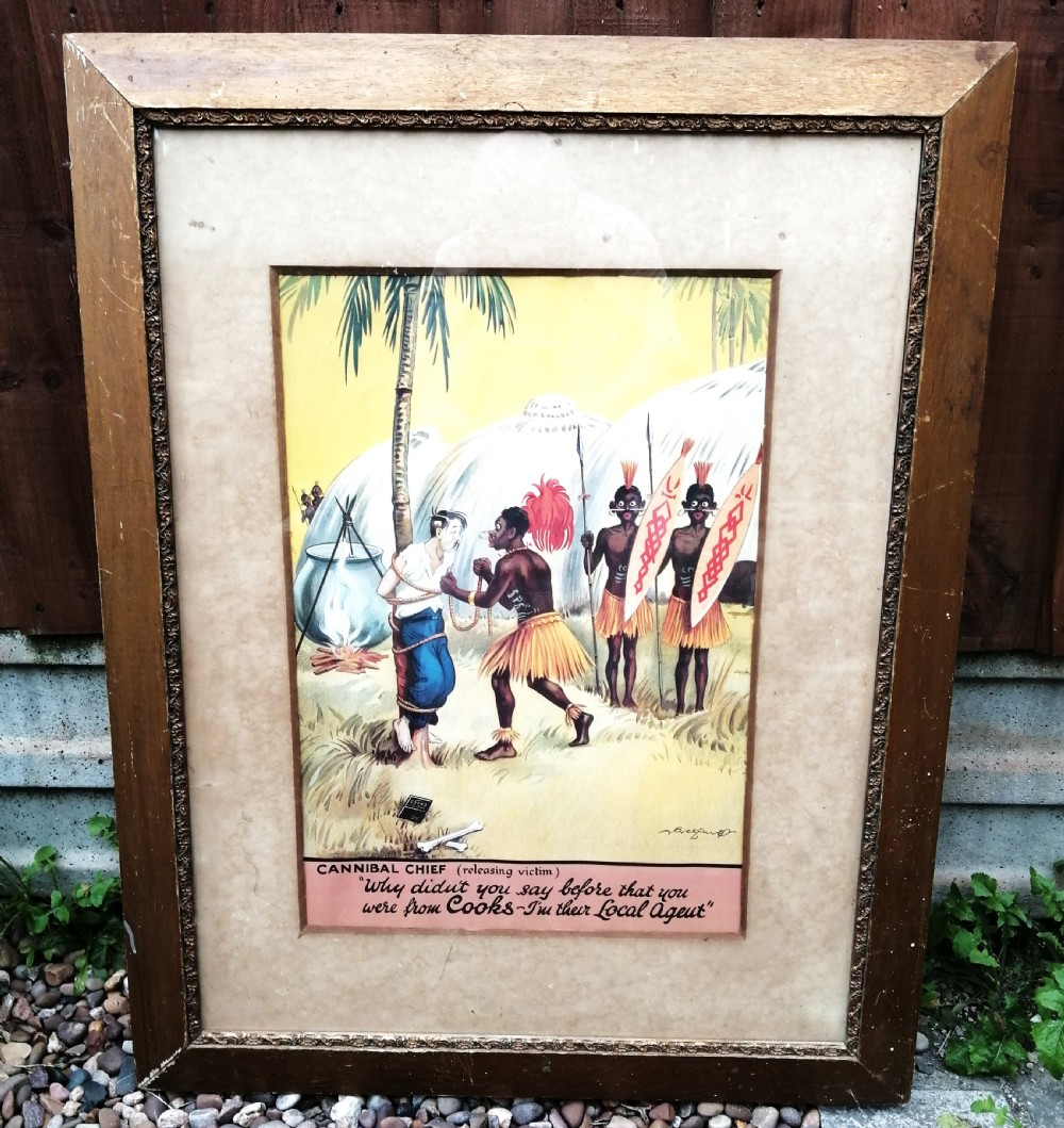 A framed 1930s colour travel agency cartoon advertisement illustrating a scene with a traveler tied to a tree near tropical huts and a cooking pot. View II