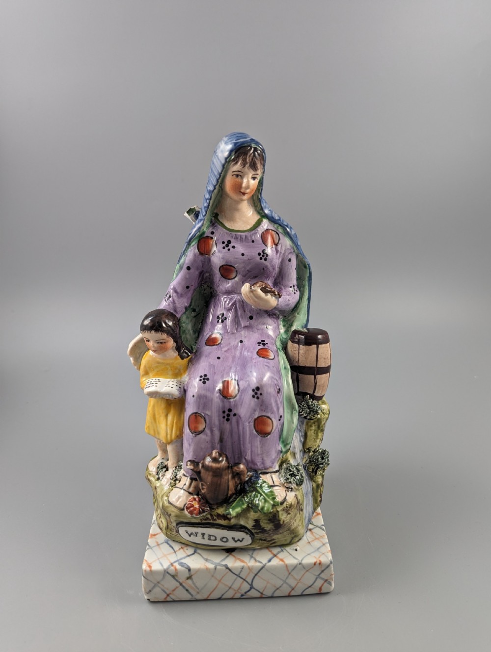 The Widow of Zarephath Staffordshire pottery figure, 9