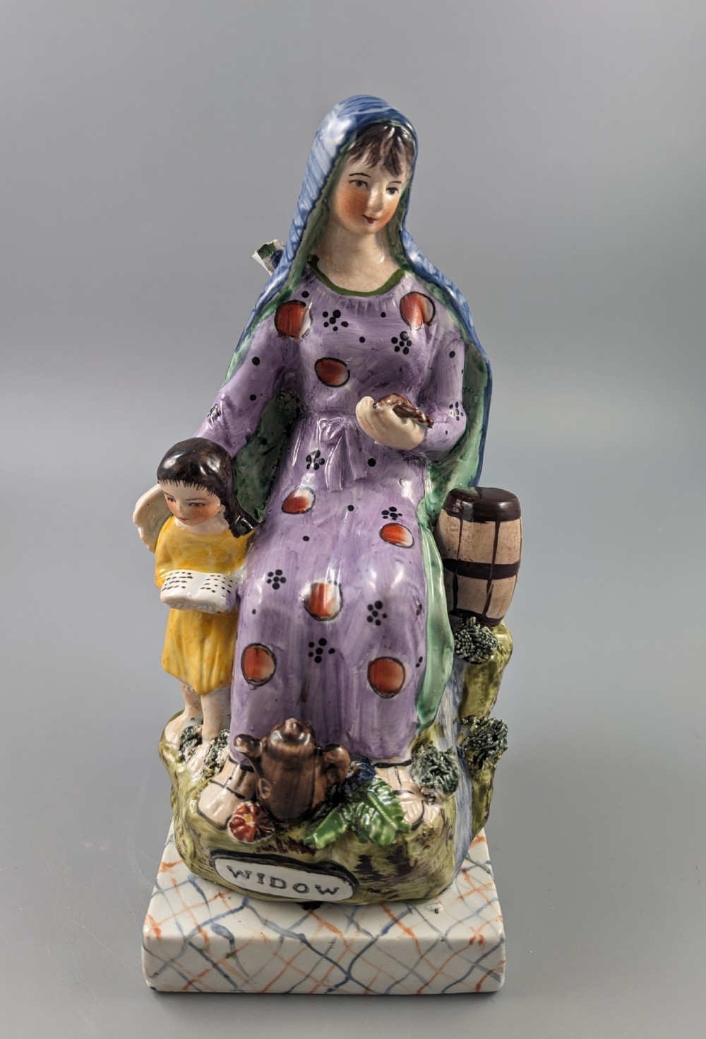 The Widow of Zarephath Staffordshire pottery figure, 9