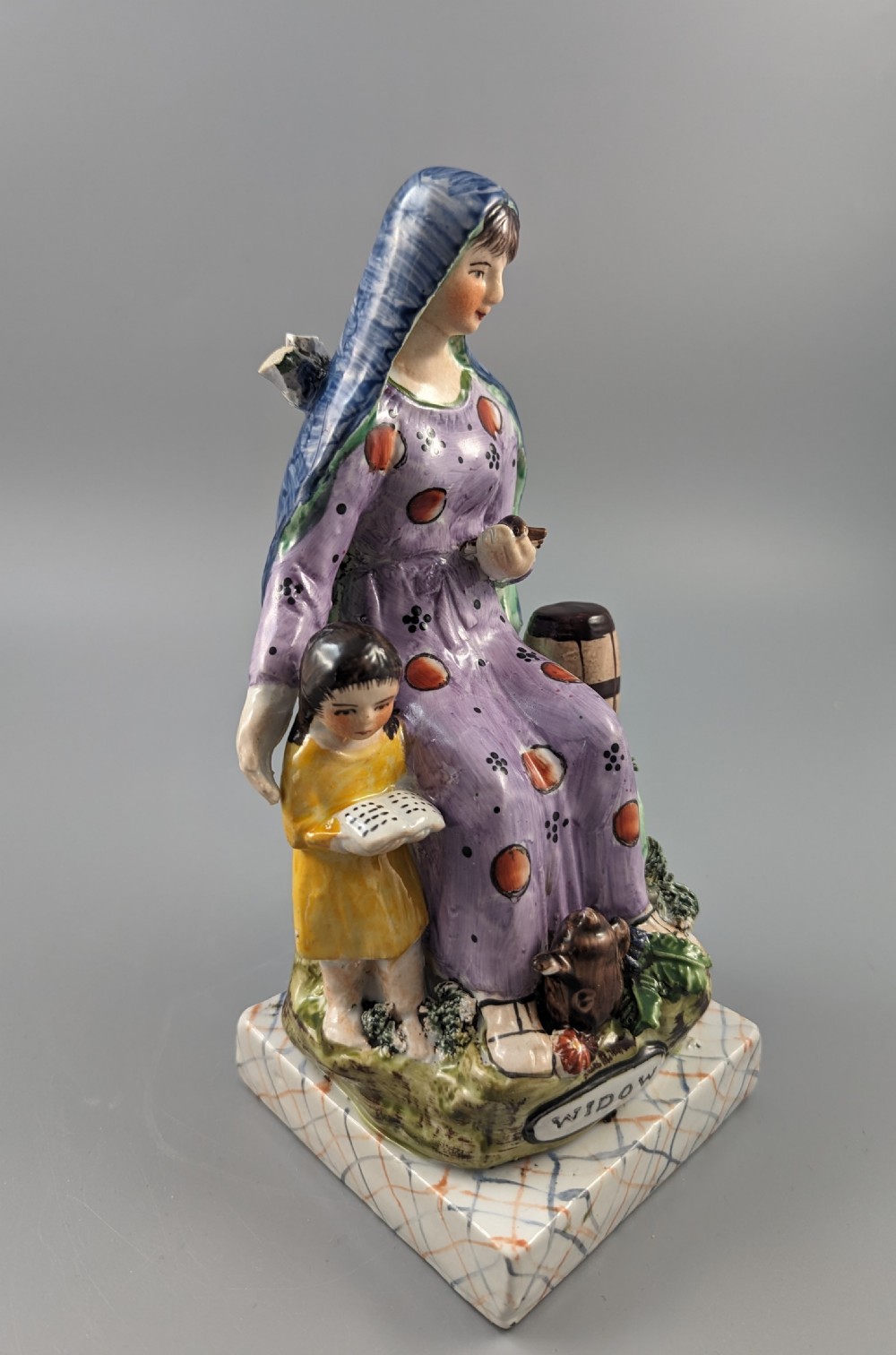 The Widow of Zarephath Staffordshire pottery figure, 9
