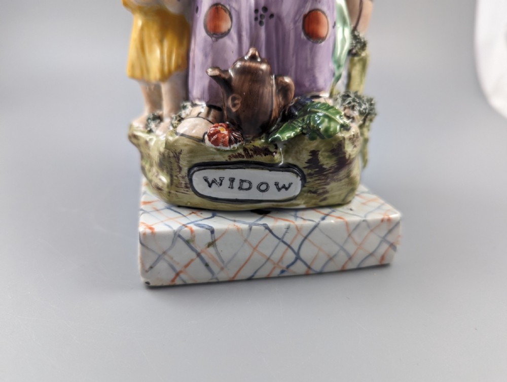 The Widow of Zarephath Staffordshire pottery figure, 9