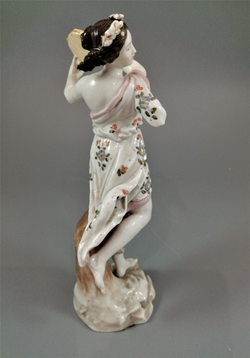 Woman with a tambourine by Meissen, middle 19th century. View X