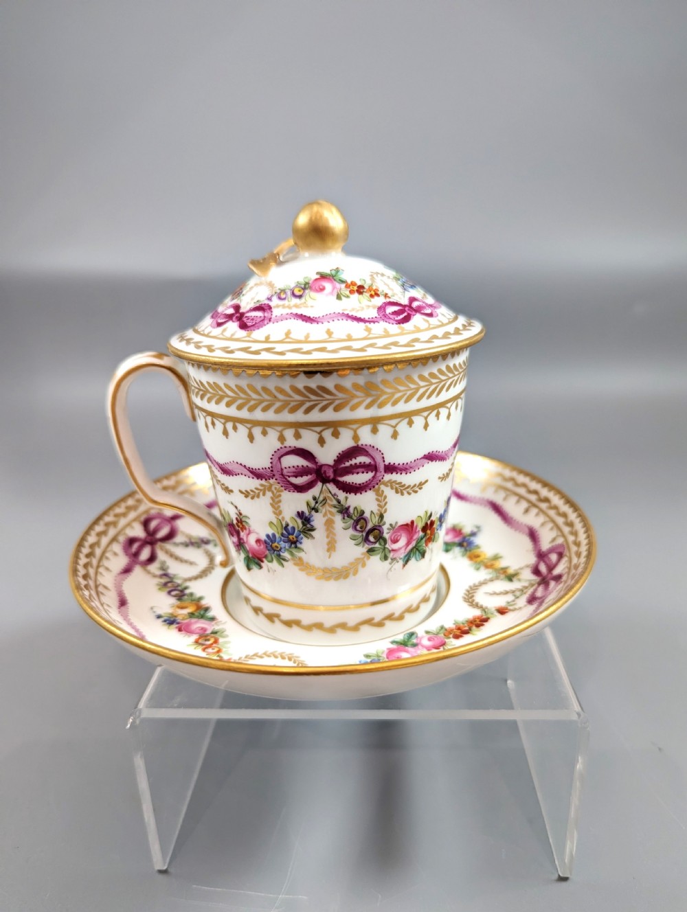 Floral and gold mid-18th century Sèvres style cup, saucer and lid set 