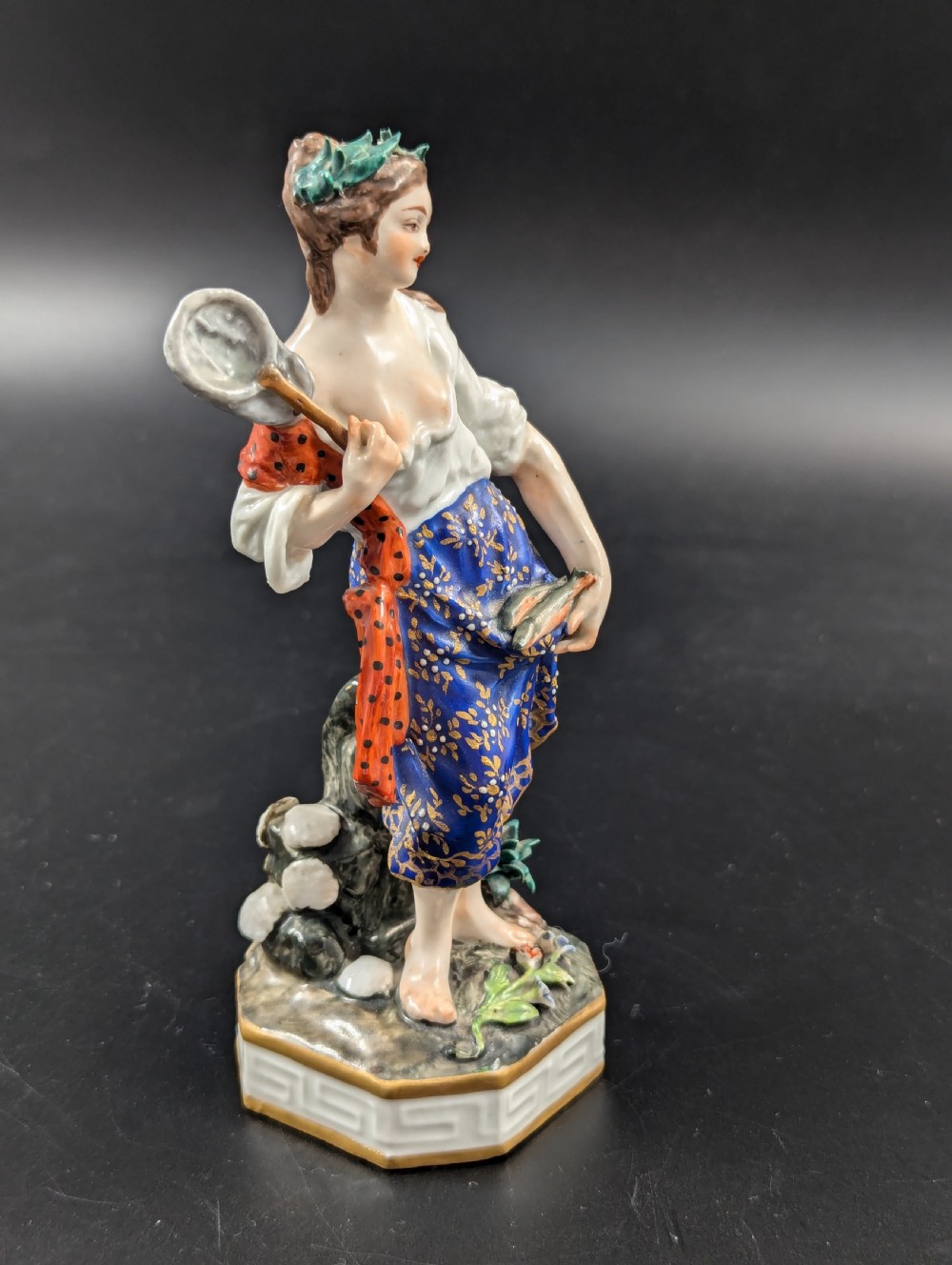 An antique hand-painted Derby porcelain figurine depicting an allegory of water on a moulded base. View VI