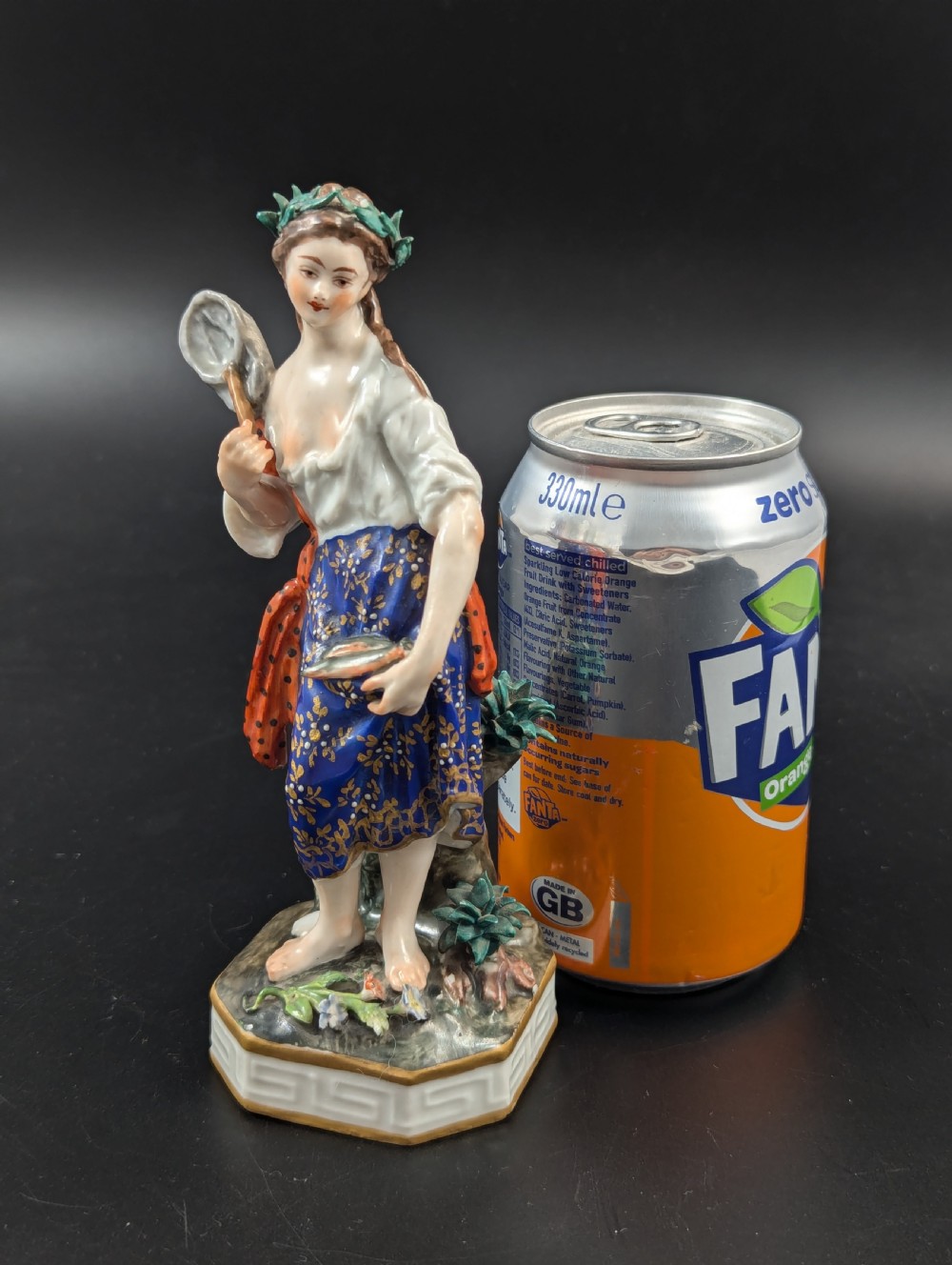An antique hand-painted Derby porcelain figurine depicting an allegory of water on a moulded base. View VIII
