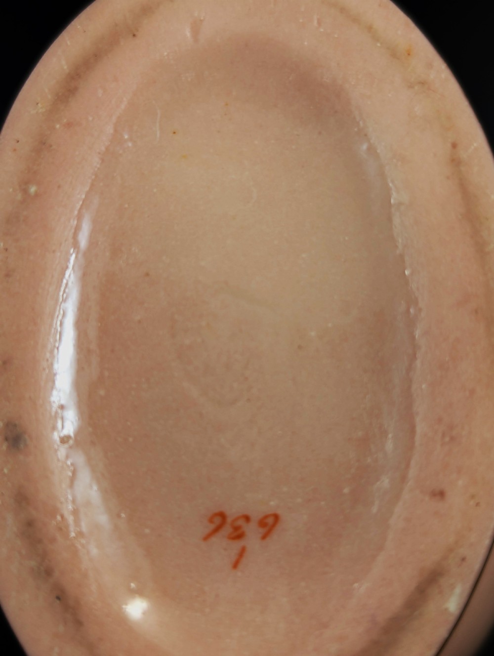 A blush pink porcelain vase featuring white pate-sur-pate fern foliage decoration and two gilded serpent handles. View X