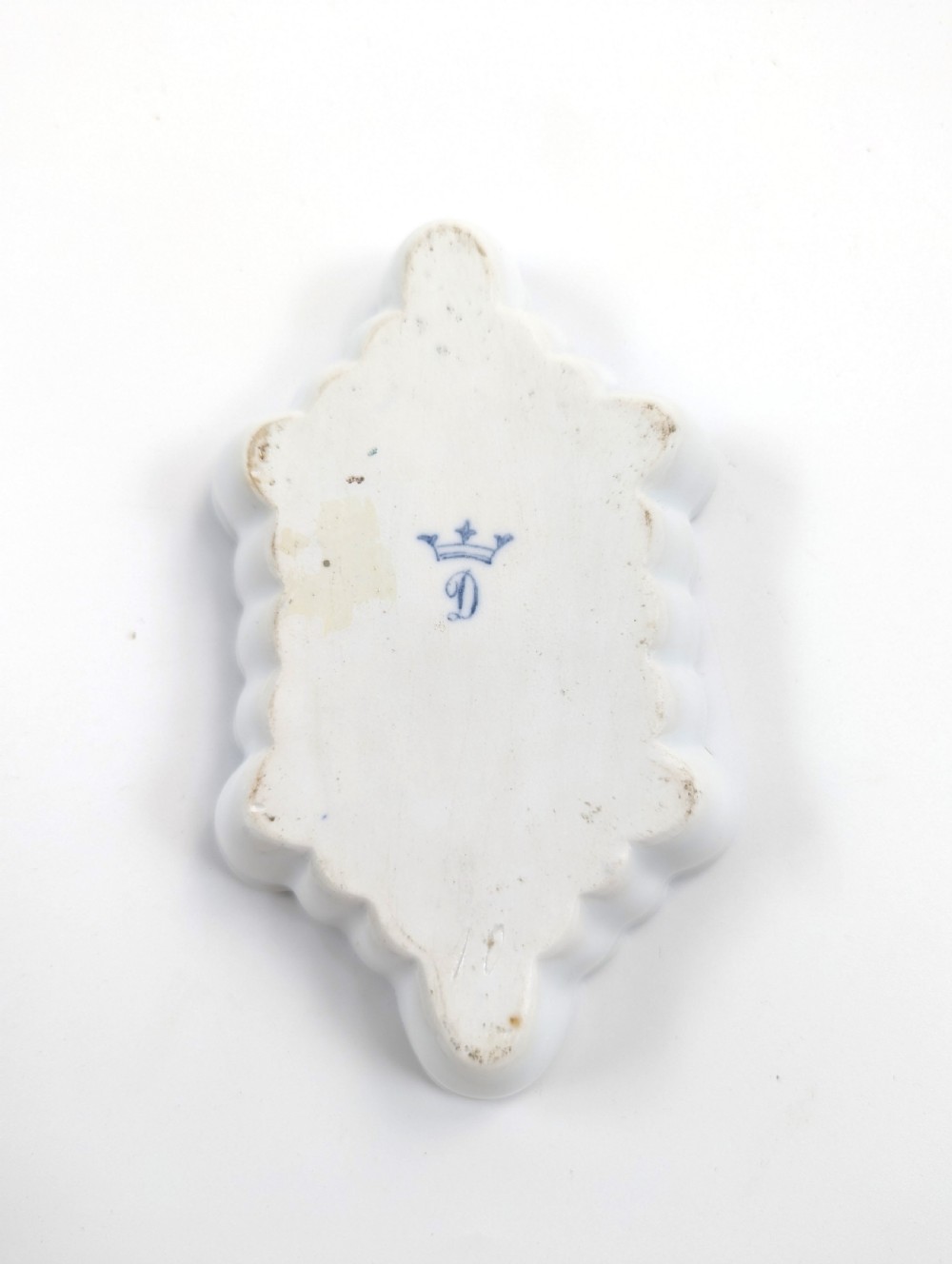 An oval lobed Dresden porcelain dish featuring a cobalt blue rim decorated with gilt scrollwork and a central hand-painted equestrian scene. View X