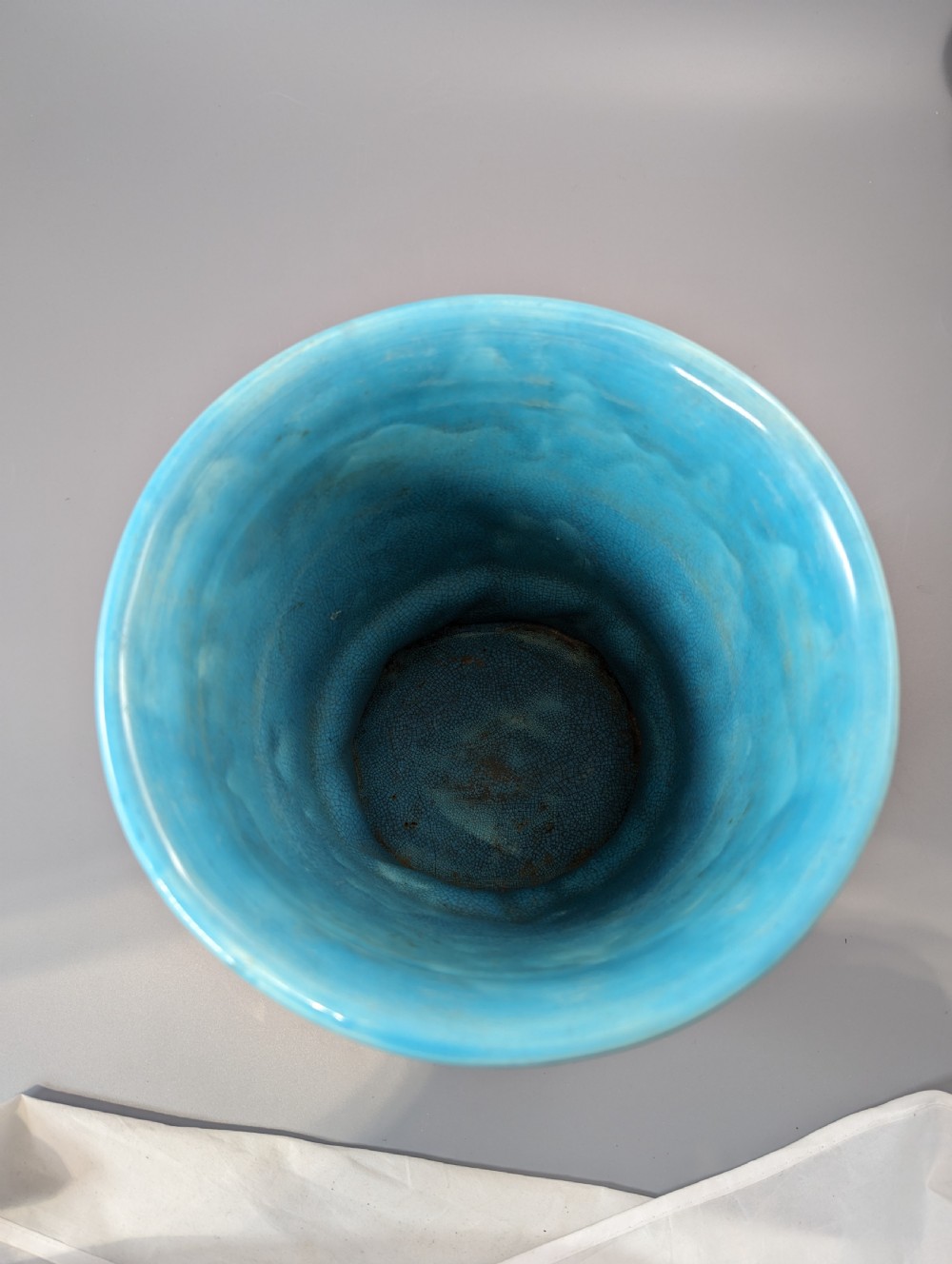 A Victorian Royal Worcester turquoise majolica jardiniere planter featuring relief-moulded foliage and a faux-woodland base. View V