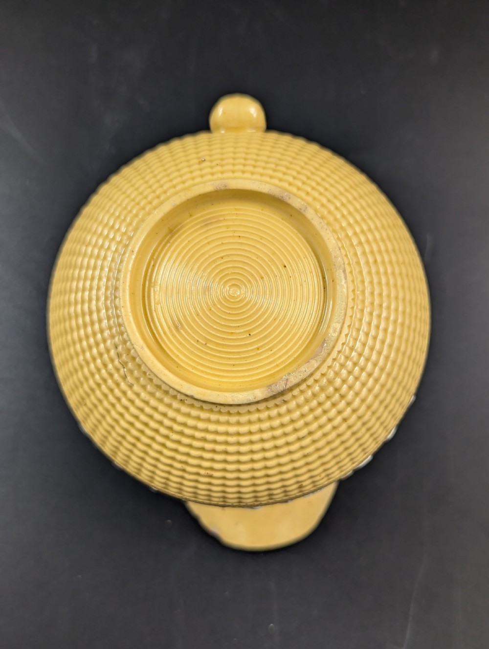 A Regency period buff stoneware teapot and matching creamer jug featuring engine-turned lattice patterning and applied white botanical reliefs. View XIII