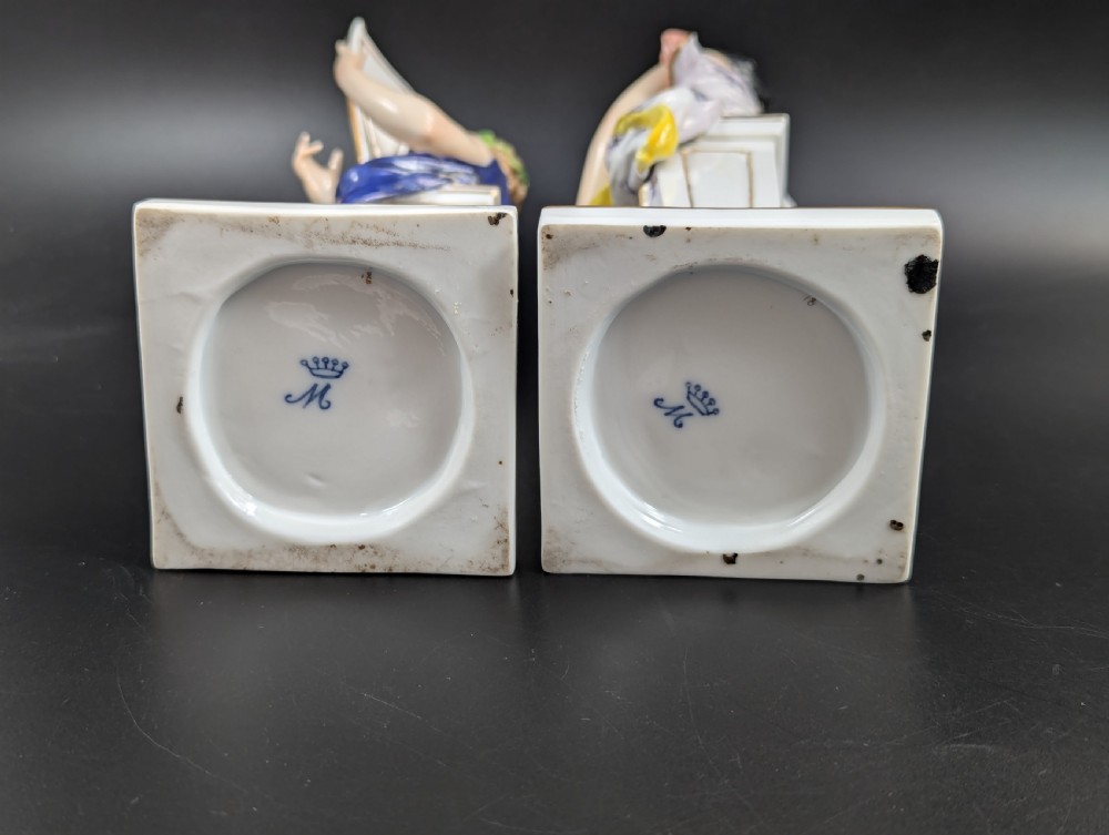 A set of four 19th-century glazed Italian porcelain figurines depicting allegorical female figures representing the arts atop gilded square pedestals. View VII
